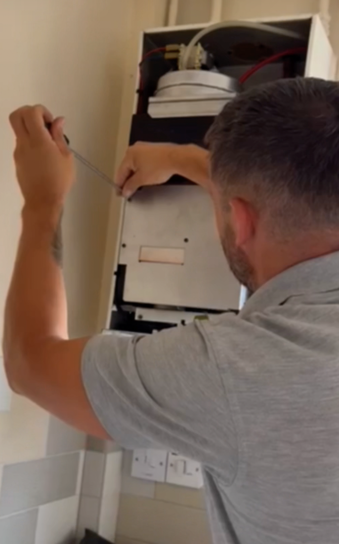 KAS Energy plumber carrying out repairs in a Derbyshire home