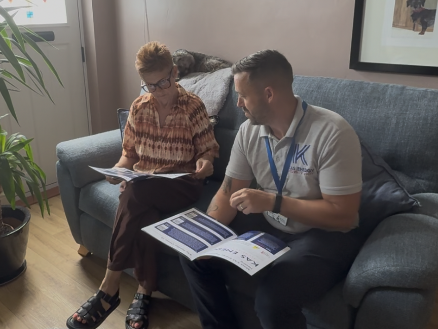 KAS Energy sales advisor going through boiler options with a homeowner in Derbyshire