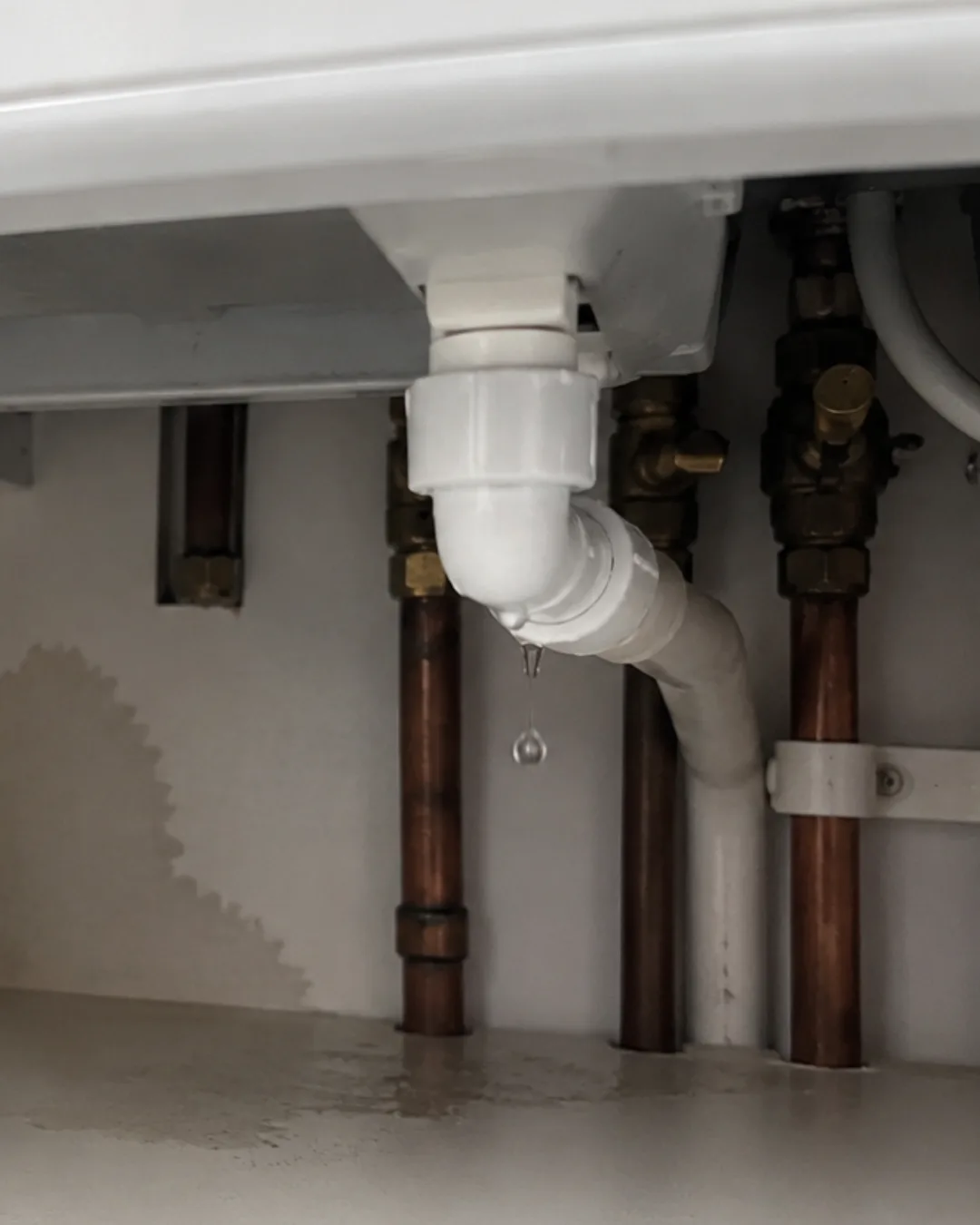 KAS Energy Gas Safe engineer inspecting a leaking boiler in Derbyshire